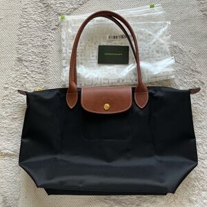 Longchamp bag
LE PLIAGE ORIGINAL M TOTE BAG
Black - Recycled Canvas